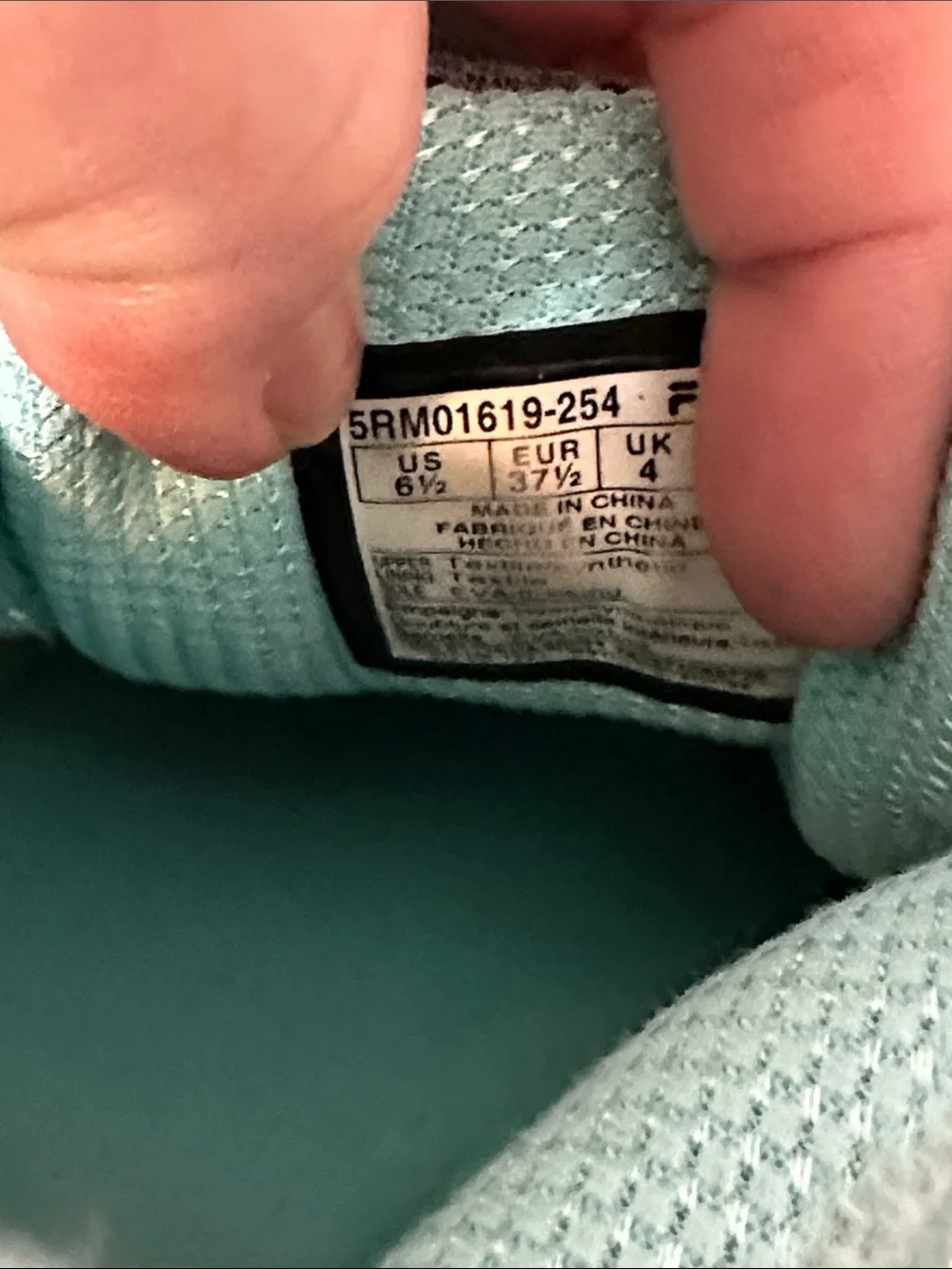 Fila women’s sneakers. Ultra lightweight. Size 6.5. Gray and teal. Breathable